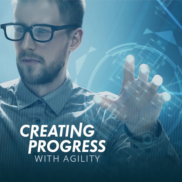 Picture of man with glasses, with inscription Creating Progress with Agility.